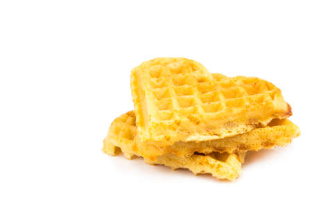 Freshly baked belgian waffles isolated on white background.の写真素材