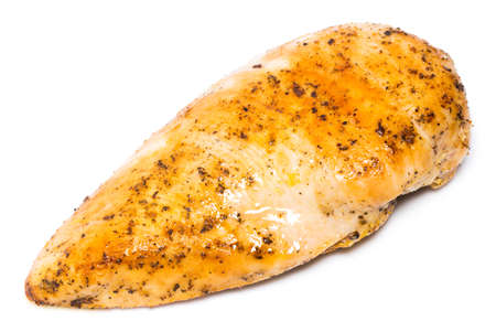  grilled chicken breast with black pepper and spices isolated on white.の写真素材