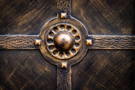 ornate wrought-iron elements of metal gate decoration.