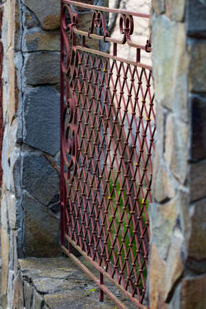 ornate wrought-iron elements of metal gate decoration.の写真素材