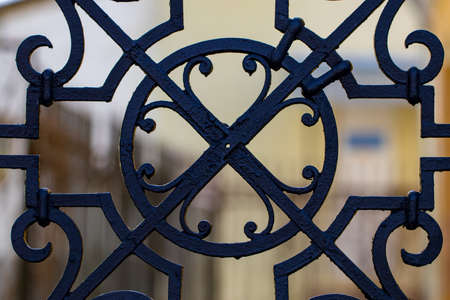 ornate wrought-iron elements of metal gate decoration.の写真素材