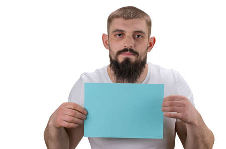 young man holding blank sign in hands  isolated on white background.の写真素材