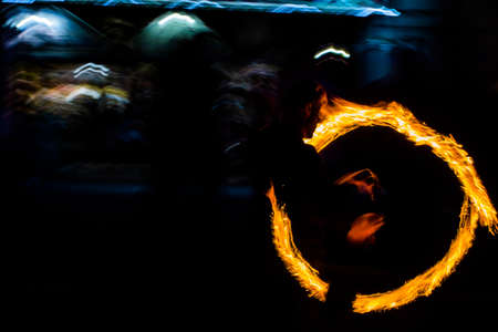 Fire dancers Swing fire dancing show fire show dance man juggling with fire.