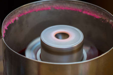 close up of machine to make cotton sugar candy.の写真素材