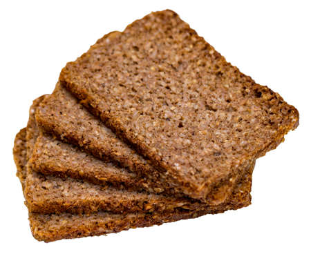 Slices of whole wheat multigrain toast isolated on white background.