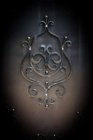 wrought-iron gates, ornamental forging, forged elements close-up.の写真素材