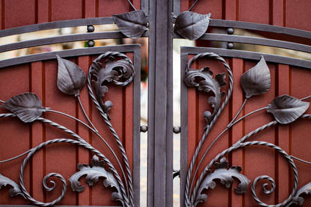 ornate wrought-iron elements of metal gate decoration.の写真素材