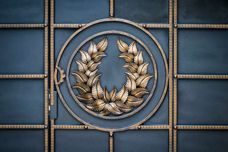 wrought-iron gates, ornamental forging, forged elements close-up.