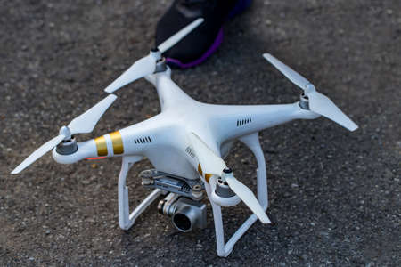 drone with digital camera on the road background.の写真素材