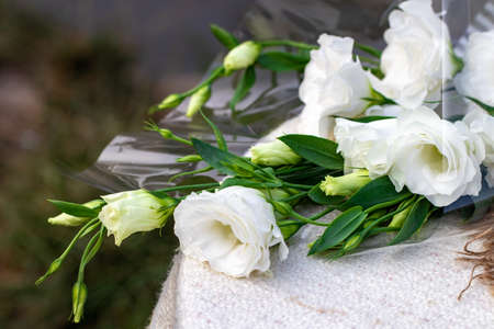 lisianthus white bouquet is on the table.の写真素材