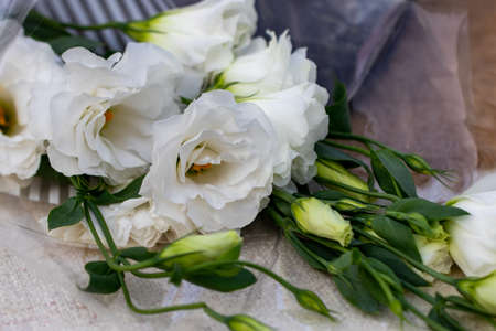 lisianthus white bouquet is on the table.の写真素材