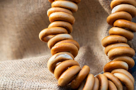 bunch of bagels on the background burlap. Copy space for your text.の写真素材