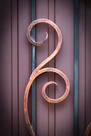 wrought-iron gates, ornamental forging, forged elements close-up.の写真素材