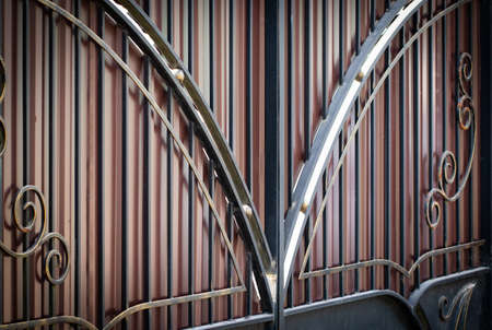 beautiful decorative metal elements forged wrought iron gates.の写真素材