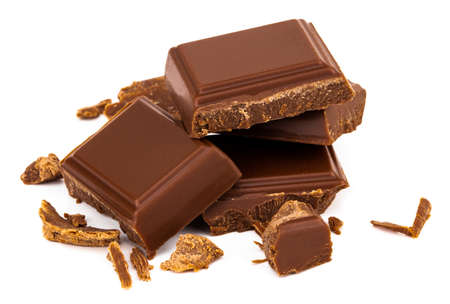 Three milk chocolate pieces isolated on white background.