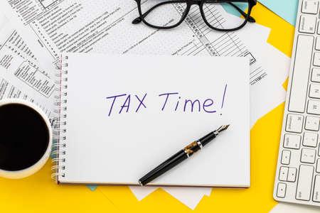 Tax time - Notification of the need to file tax returns, tax form at accauntant workplace.の写真素材