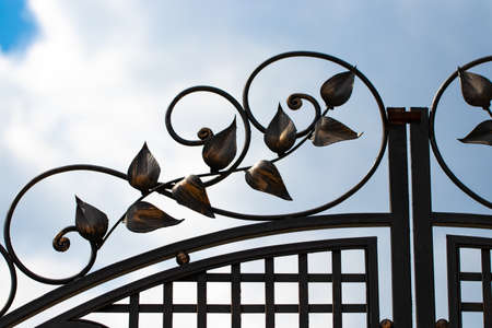 beautiful decorative metal elements forged wrought iron gates.の写真素材