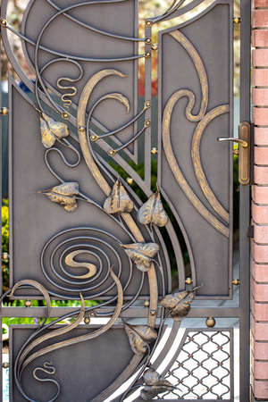 beautiful decorative metal elements forged wrought iron gates.の写真素材