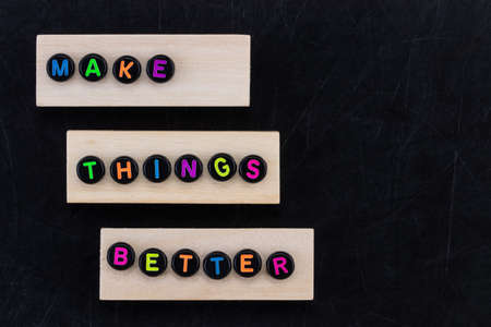 Make things better - Improvement Concept. Black background.の写真素材
