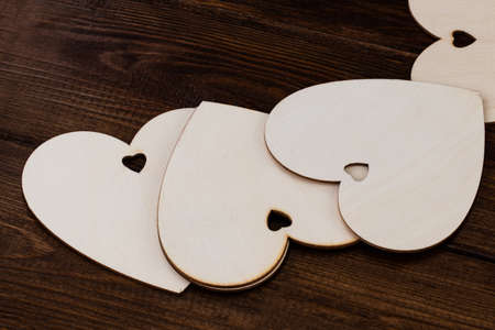 Wooden hearts placed nicely on a wooden