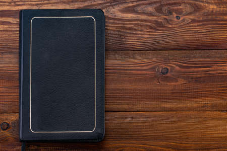 Closed up bible on woodenの写真素材