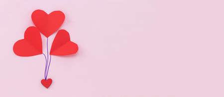 Valentines Day background. Red hearts on pastel pink background. Valentines day concept. Flat lay,...