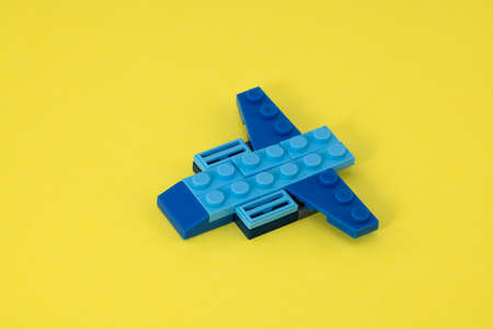 Airplane from the constructor on a yellow background.