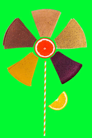 abstract flower made from pastille and fruit. Summer concept.