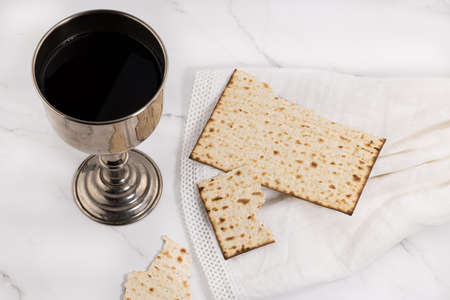 Holy communion chalice with wine, bread, and Bible. Lord's supper.の写真素材