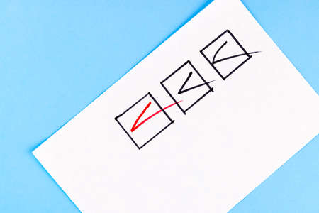 Red marking on checklist box with pen, Checklist concept.の写真素材