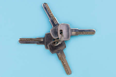 keys on a blue background, top view with copy space.の写真素材
