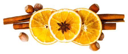 orange dried slices, cinnamon sticks and star anise isolated on white background.の写真素材