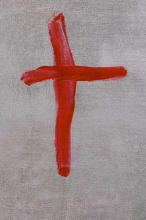 Crucifix ox Jesus Christ made with blood on gray background. copyspace. top view. Palm Sunday, Good Friday, Easter concept, Christ resurrection, gospel, salvation concept. Banner.の写真素材