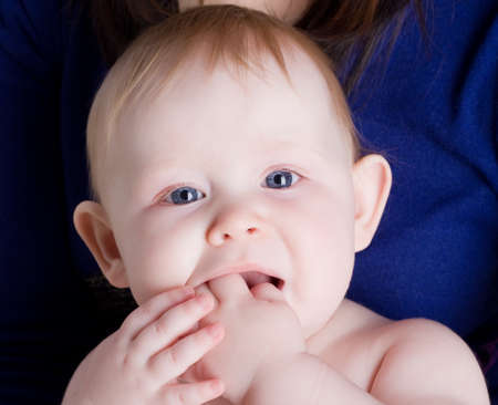 Little baby girl with her mom