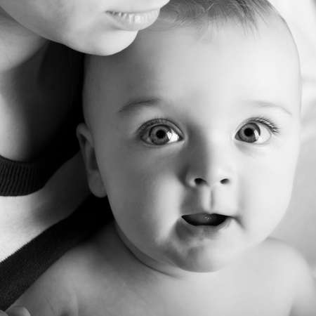 Black-white image of mother with babyの写真素材