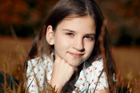 portrait of beautiful smile girl outdoorの写真素材