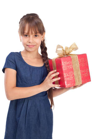 Smile girl with red giftbox isolated over whiteの写真素材