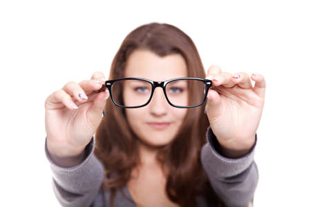 Attractive girl in glasses isolated over white