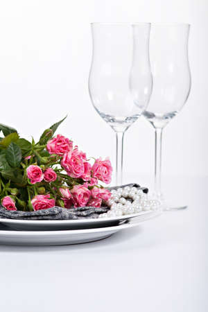 Festive table setting with rosesの写真素材
