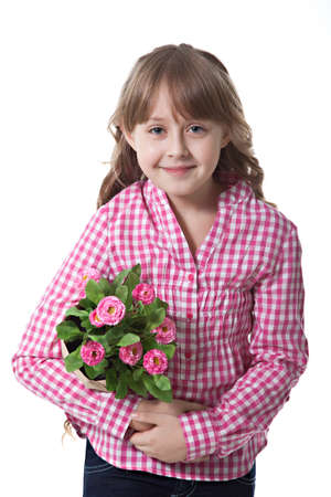 Cute girl with flower isolated over whiteの写真素材