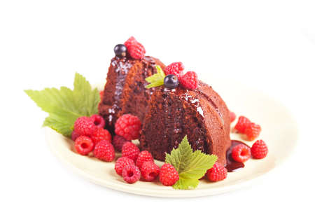beautiful chocolate cake with fresh berry and chocolate glazeの写真素材