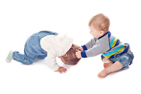 Conflict of two children. Studio shootingの写真素材