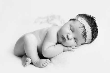 Portrait of  sleeping newborn baby girl bwの写真素材