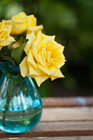 Yellow roses bouquet outdoorの写真素材