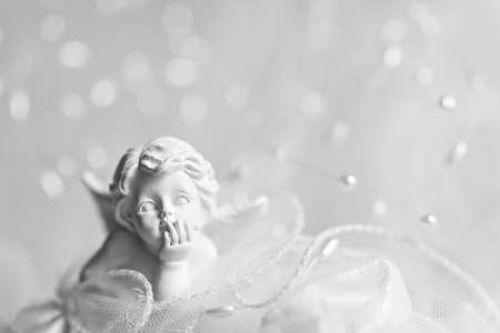 Abstract wedding background with little angel figureの写真素材
