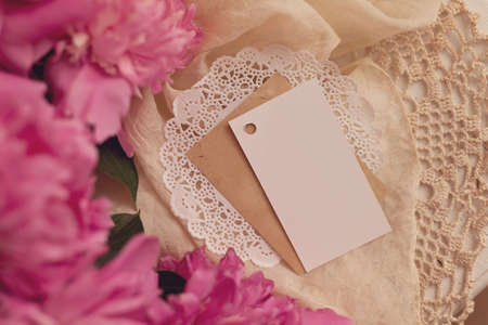 Old vintage tags with peonies flowers bouquet