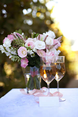 Outdoor table setting with flowersの写真素材