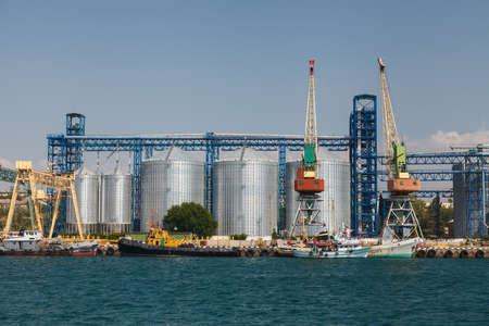 Cargo port with cranes and grain dryers