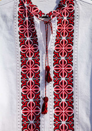 Ukrainian blouse embroidered with red and black threadの写真素材