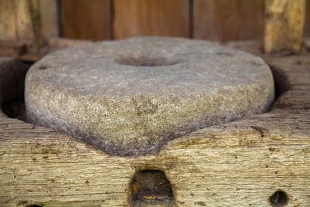 Mill stone circle for grinding, grinding grain into flour.の写真素材